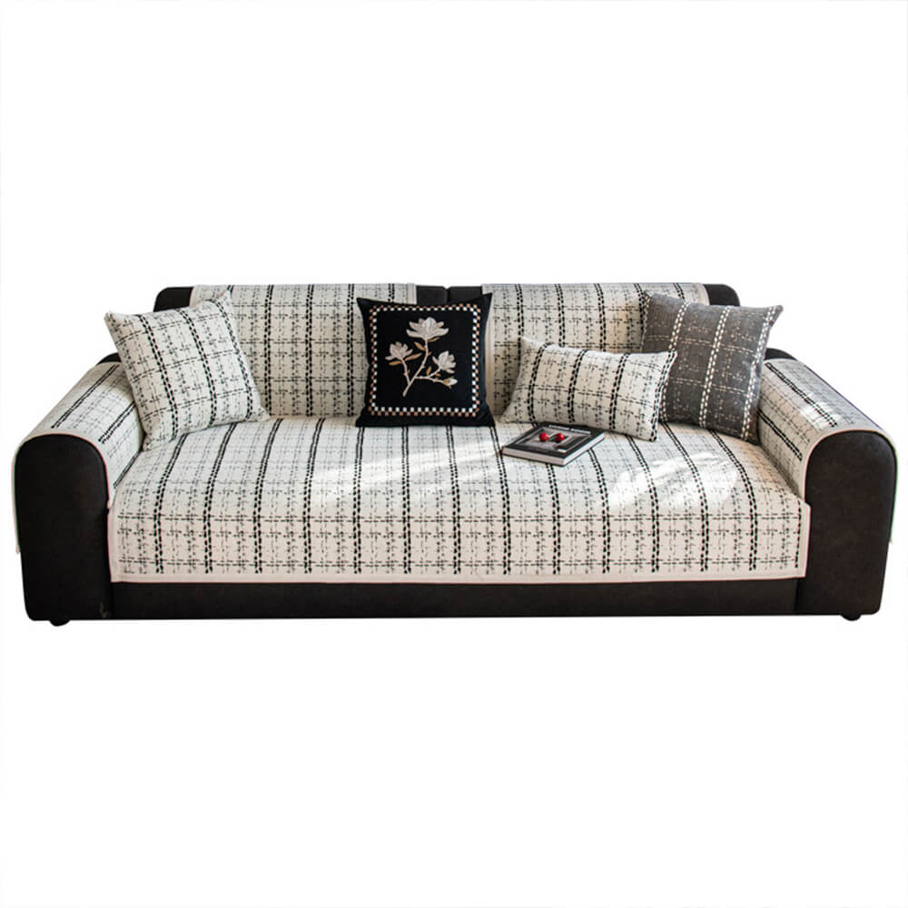 Elegant chenille couch cover with a jacquard checkered design, perfect non-slip home decor.