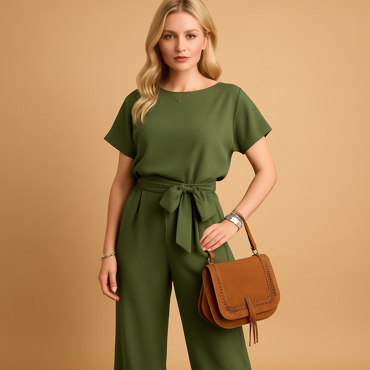 Feminine tailored jumpsuit for women featuring elegant flowy sleeves and a flattering cut.
