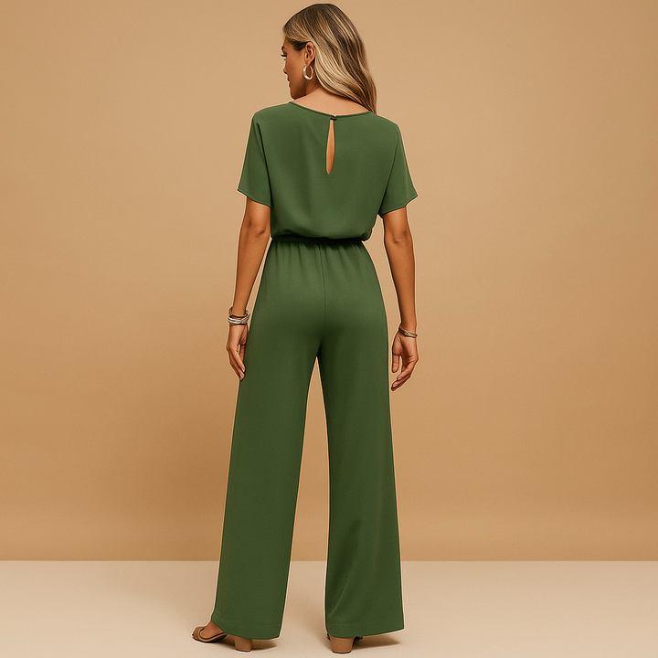 Black tailored women's jumpsuit with flowy sleeves, perfect for wedding guests & formal parties.