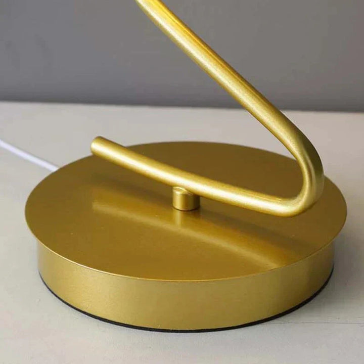 Whimsical butterfly LED table lamp emitting soft, decorative light. Perfect ambient lamp for a cozy home or office.