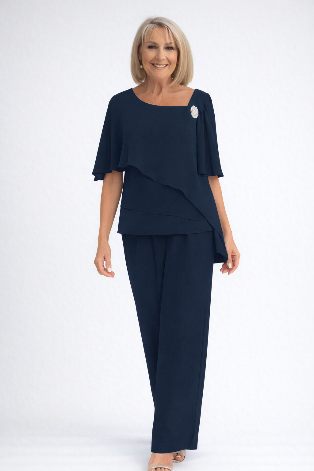 Sophisticated navy blue women's two-piece cape top & trouser set for evening wear and special events.