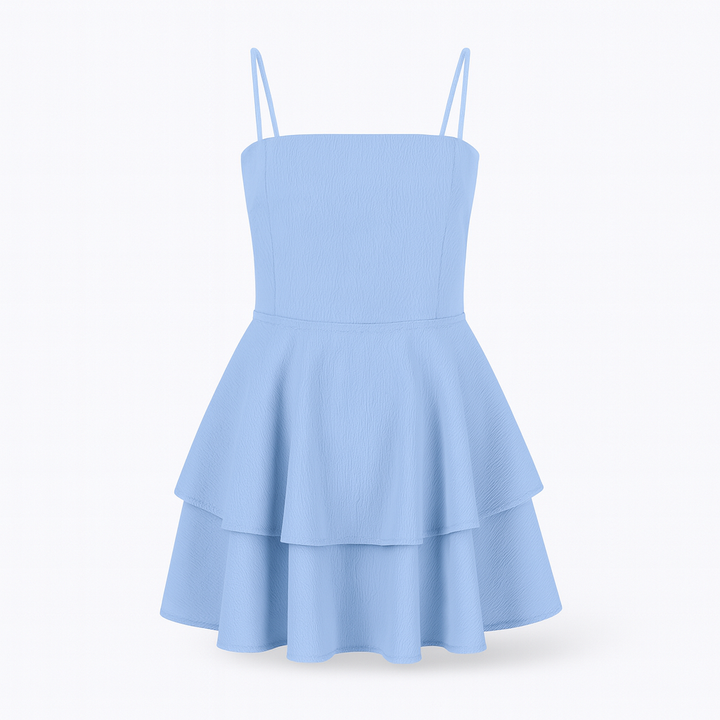 Stylish light blue spaghetti strap mini dress with ruffles, perfect for casual outings.