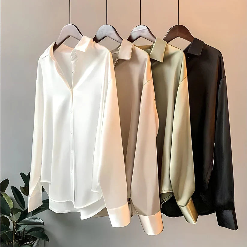 Loose fit women's long sleeve blouse for comfortable office wear. Elegant, versatile, and professional top.