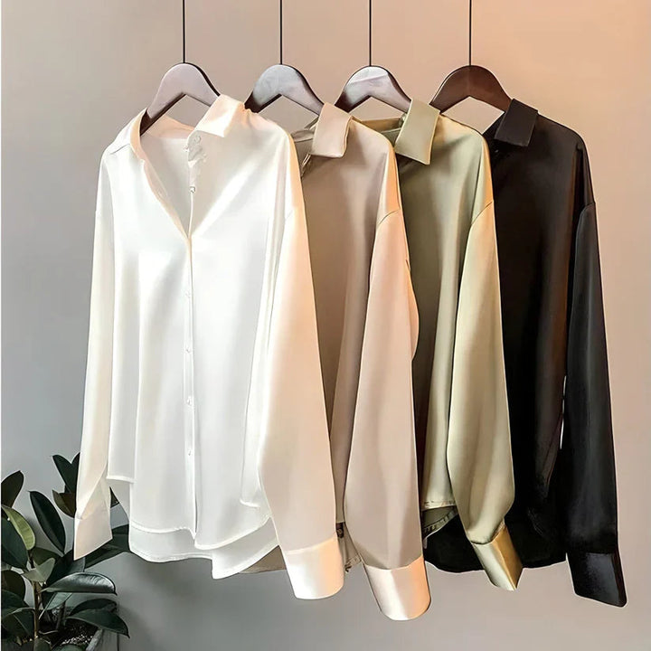 Loose fit women's long sleeve blouse for comfortable office wear. Elegant, versatile, and professional top.