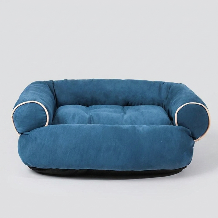 Close-up of washable, comfortable pet bed fabric, a luxurious dog couch for your beloved animal.