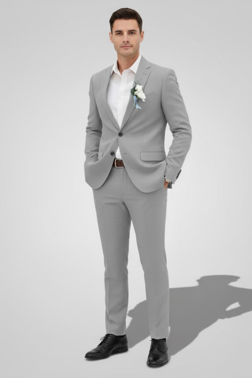 Full length view of a dapper men's slim fit wedding suit, styled for the groom or party guest. Modern & comfortable.