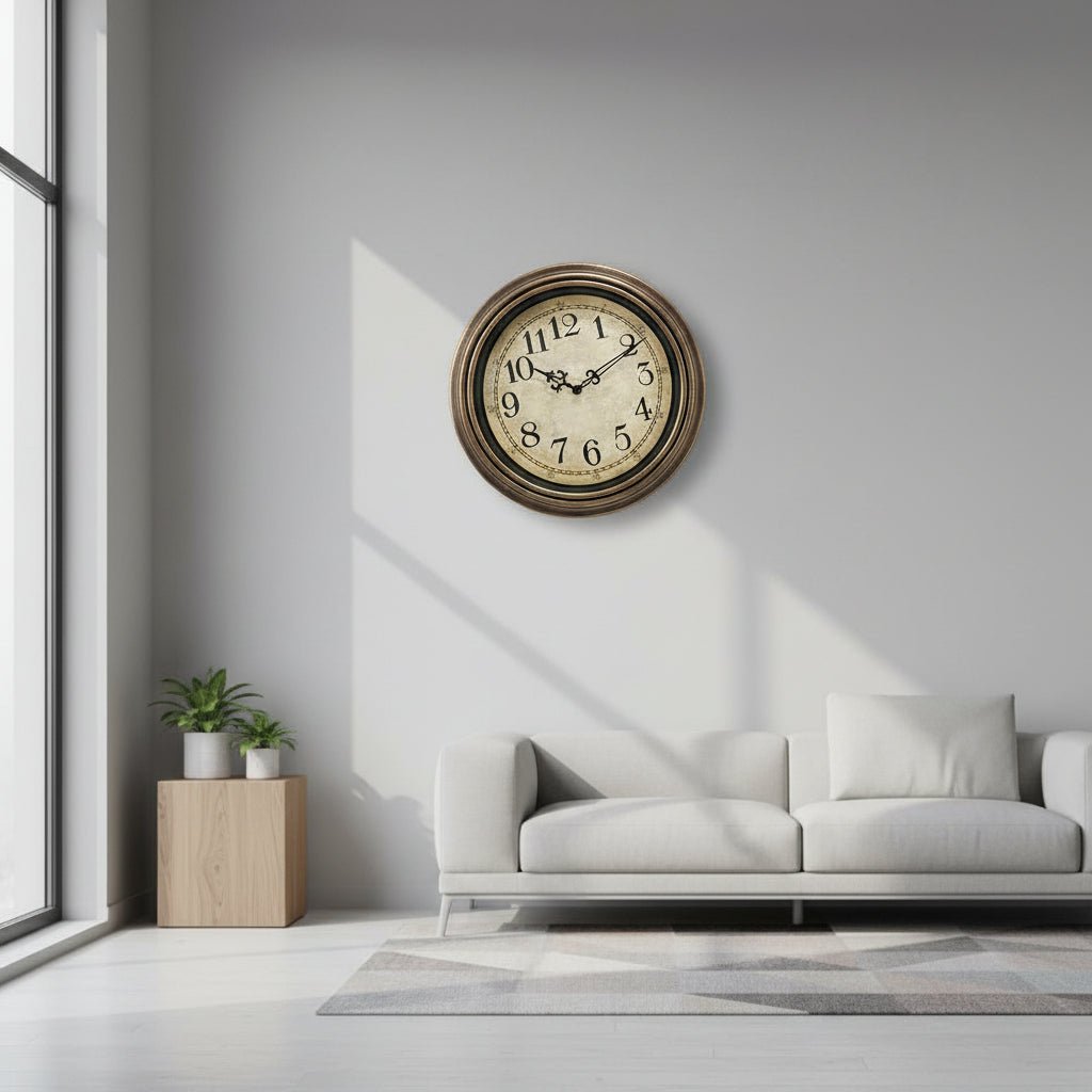 Elegant modern silent wall clock with metal frame & glass cover, perfect for living room or office decor.
