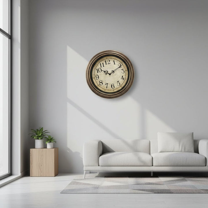 Elegant modern silent wall clock with metal frame & glass cover, perfect for living room or office decor.
