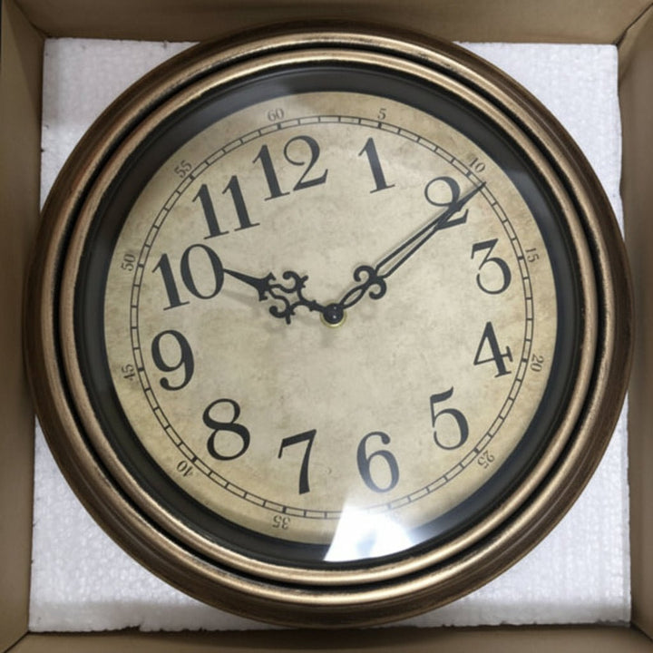 Sleek, silent quartz wall clock with elegant modern design. Features a durable metal frame & clear glass cover.