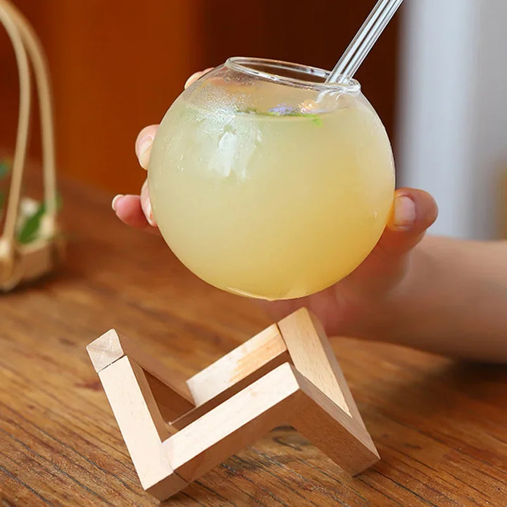 Stylish Moon Ball drinking glasses set with wooden base, a unique gift or elegant addition to any home bar or kitchen decor.