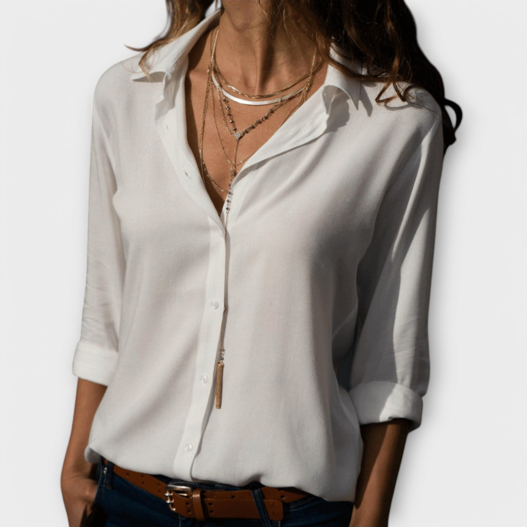 Elegant multi-color women's blouse for versatile office & evening wear. Chic long sleeve tailored top.