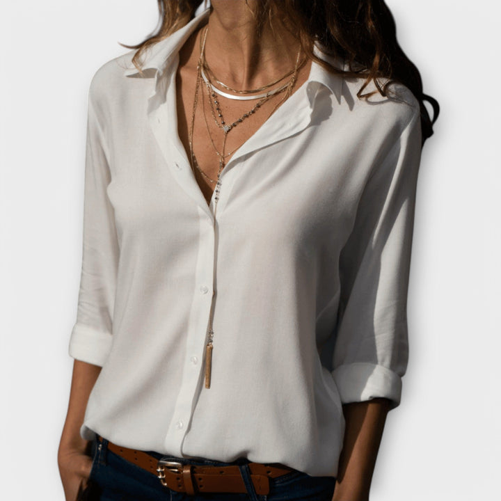 Elegant multi-color women's blouse for versatile office & evening wear. Chic long sleeve tailored top.