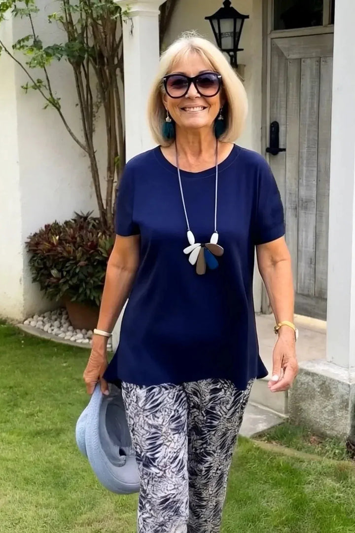 Stylish navy blue blouse with an elegant pattern, a comfortable women's top for any occasion.