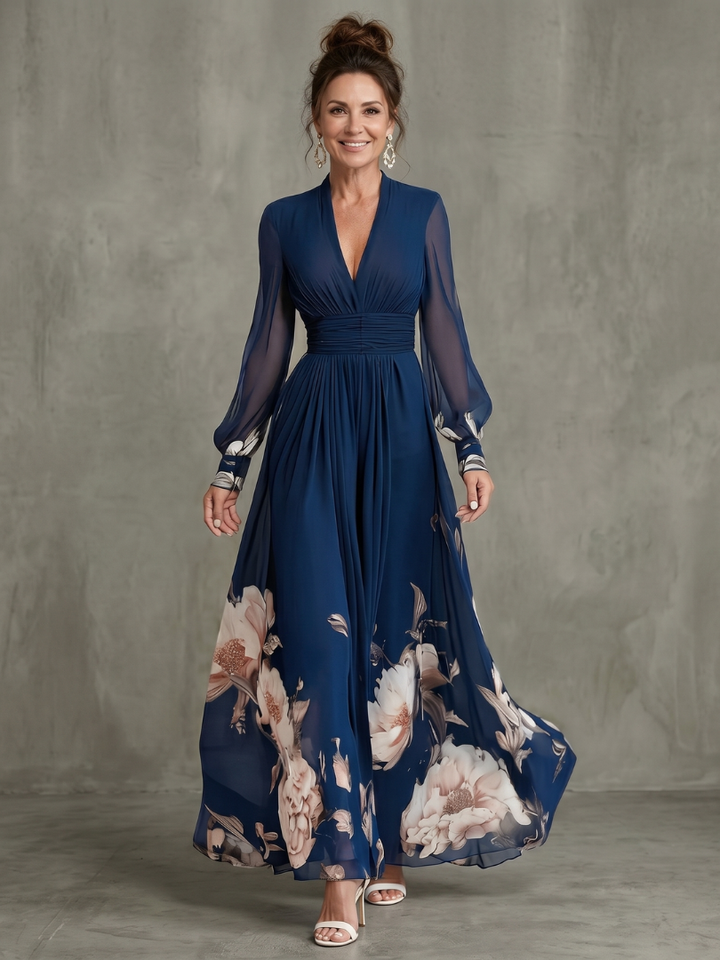 Elegant navy V-neck pleated maxi dress for women with stylish sheer long sleeves, perfect for special occasions.