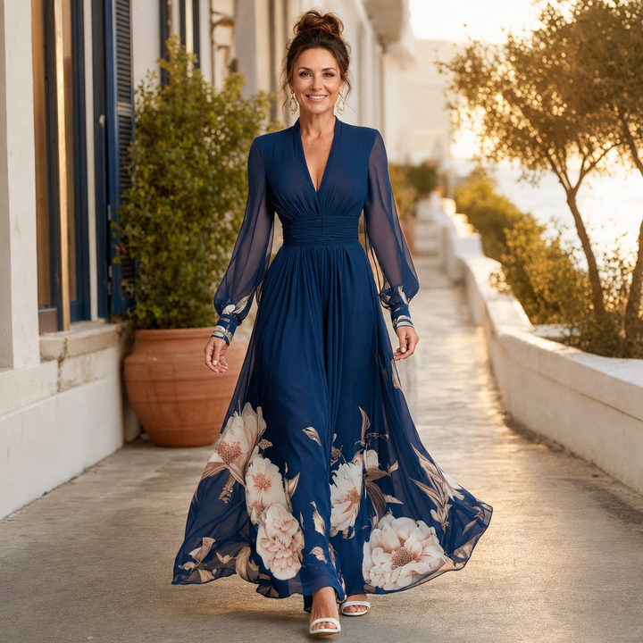 Women's flowy V-neck pleated maxi dress featuring elegant sheer sleeves. Comfortable occasion wear.