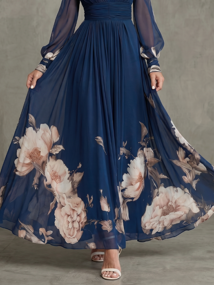 Comfortable women's elegant V-neck pleated maxi dress with chic sheer long sleeves for occasion wear.