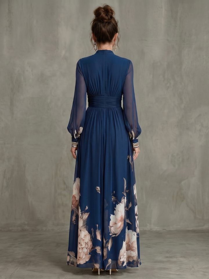 Flowy women's navy maxi dress, V-neck, pleated skirt, and elegant sheer long sleeves. Fashionable choice.