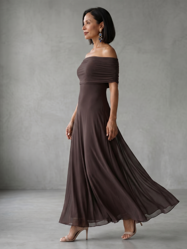 Women's coral pink off-shoulder midi dress, a sophisticated draped style for wedding guests.