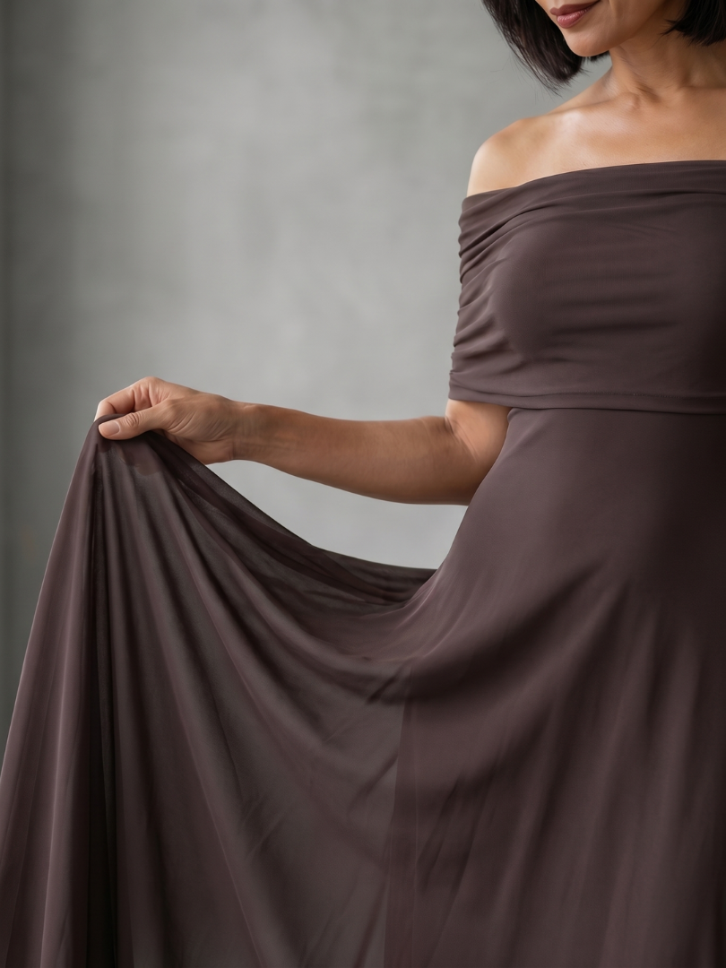 Green elegant off-shoulder midi dress with drapes, ideal formal wear for evening events & parties.