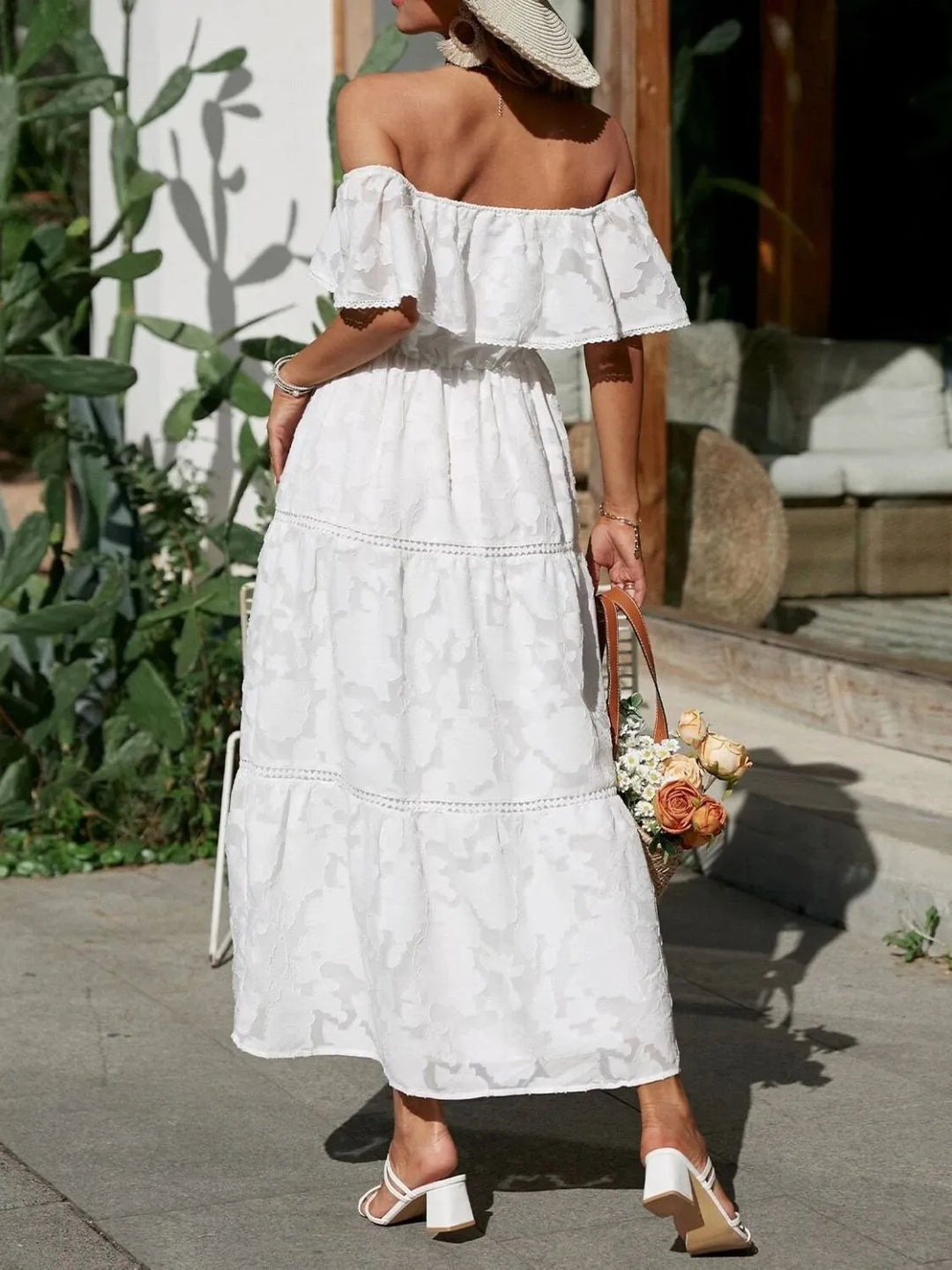 Formal off-shoulder tiered ruffle maxi dress for women, suitable for special occasions.