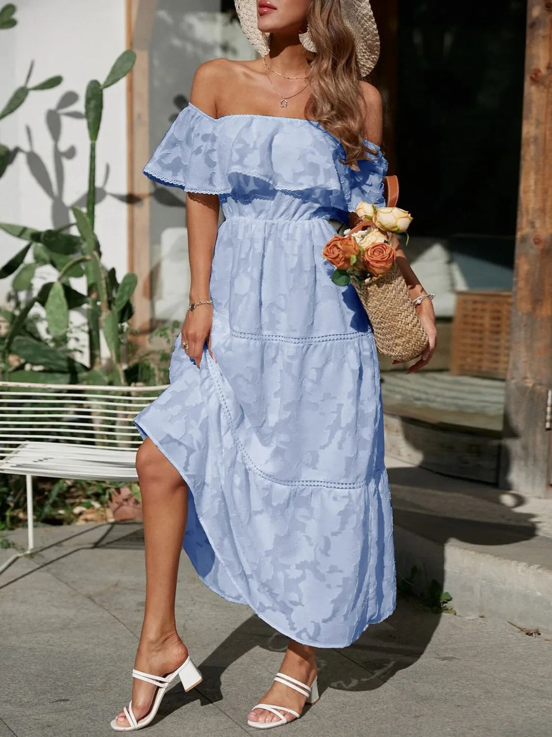 Flowy off-shoulder ruffle tiered maxi dress, perfect for a wedding guest or formal party.
