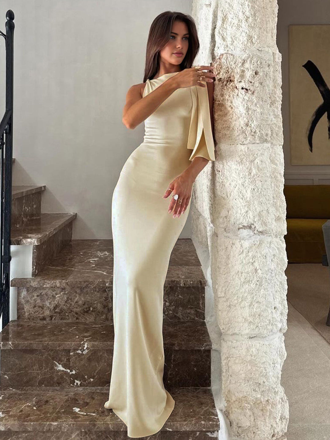 Women's formal off-white satin evening dress with a chic knotted front. Ideal elegant gown for wedding guests & special occasions.