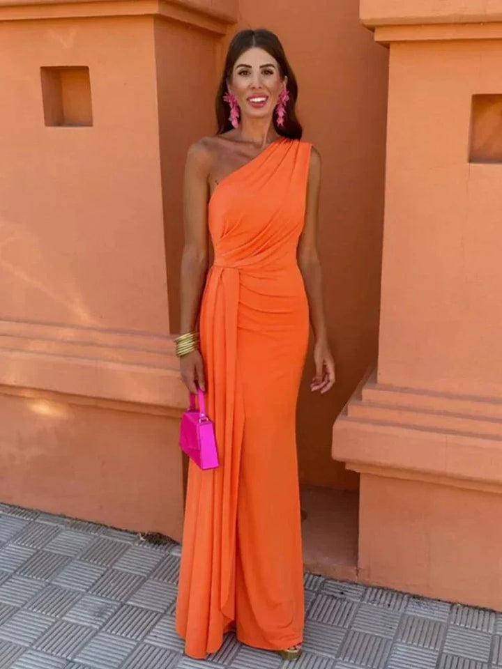 Elegant one-shoulder maxi wedding guest dress for women. Perfect formal evening gown for special occasions.