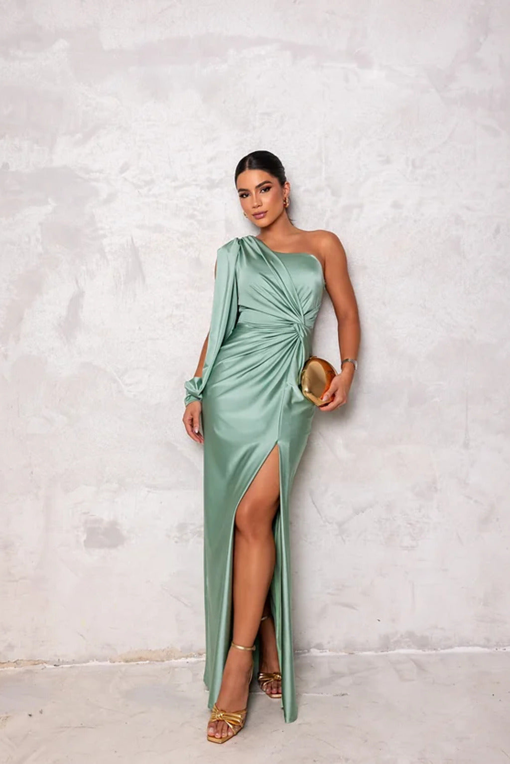Formal women's maxi dress featuring an elegant one-shoulder design and stylish ruching.