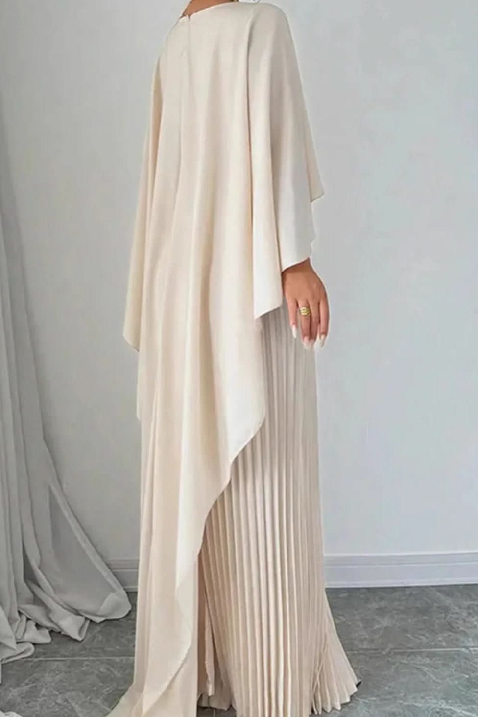 Glamorous women's long cape maxi dress with elegant pleats, ideal as an evening gown or formal wear.
