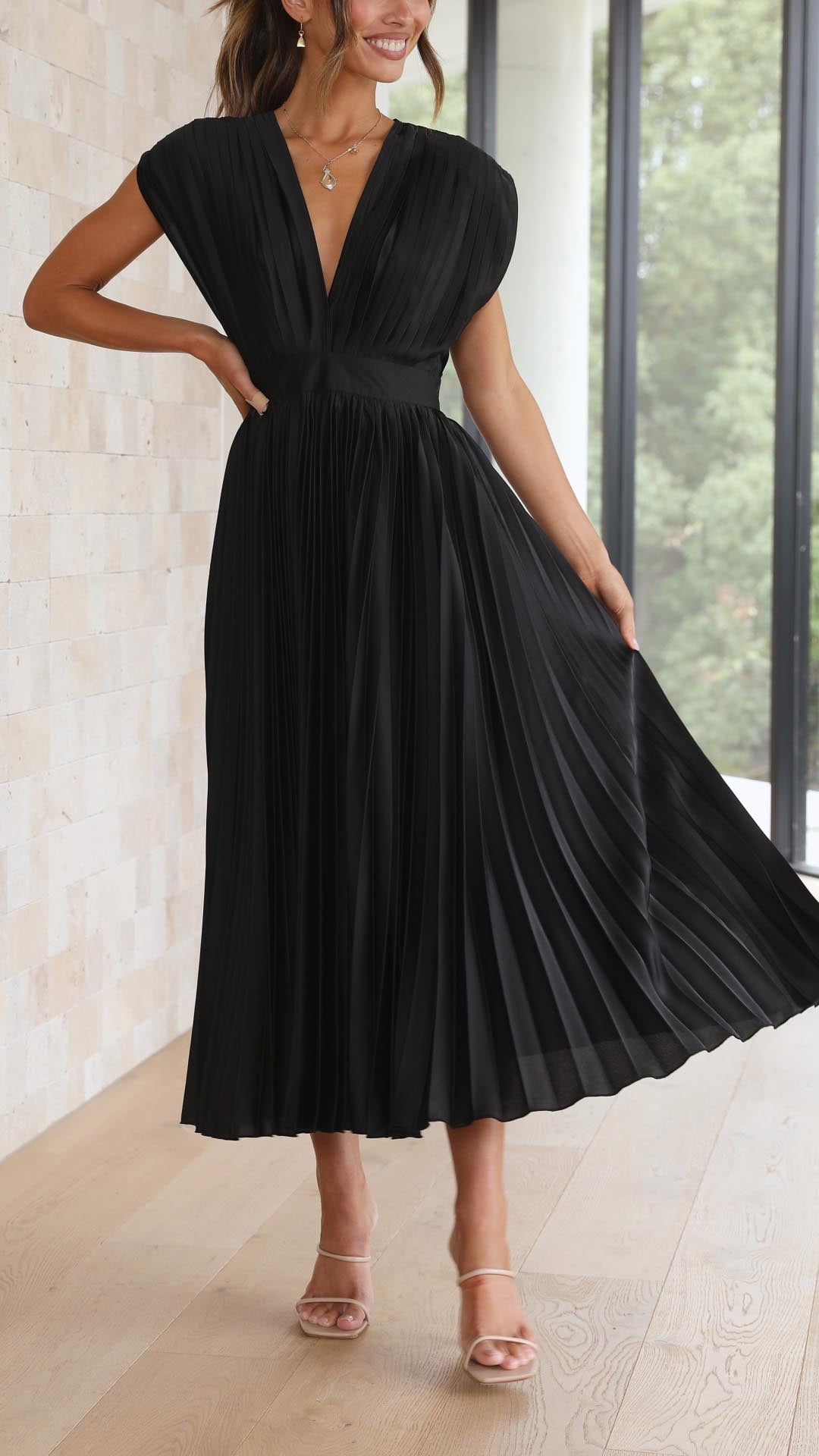 Black sophisticated pleated V-neck midi dress, ideal for cocktail & evening wear.