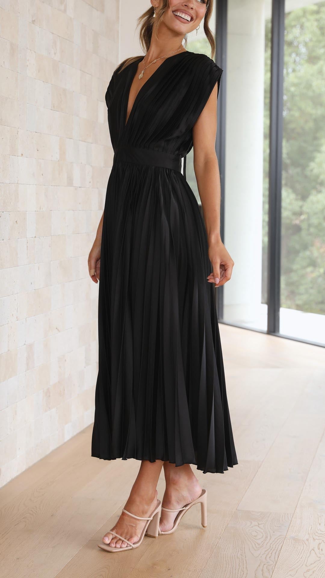 Women's elegant V-neck pleated midi dress, a stunning option for any formal event.