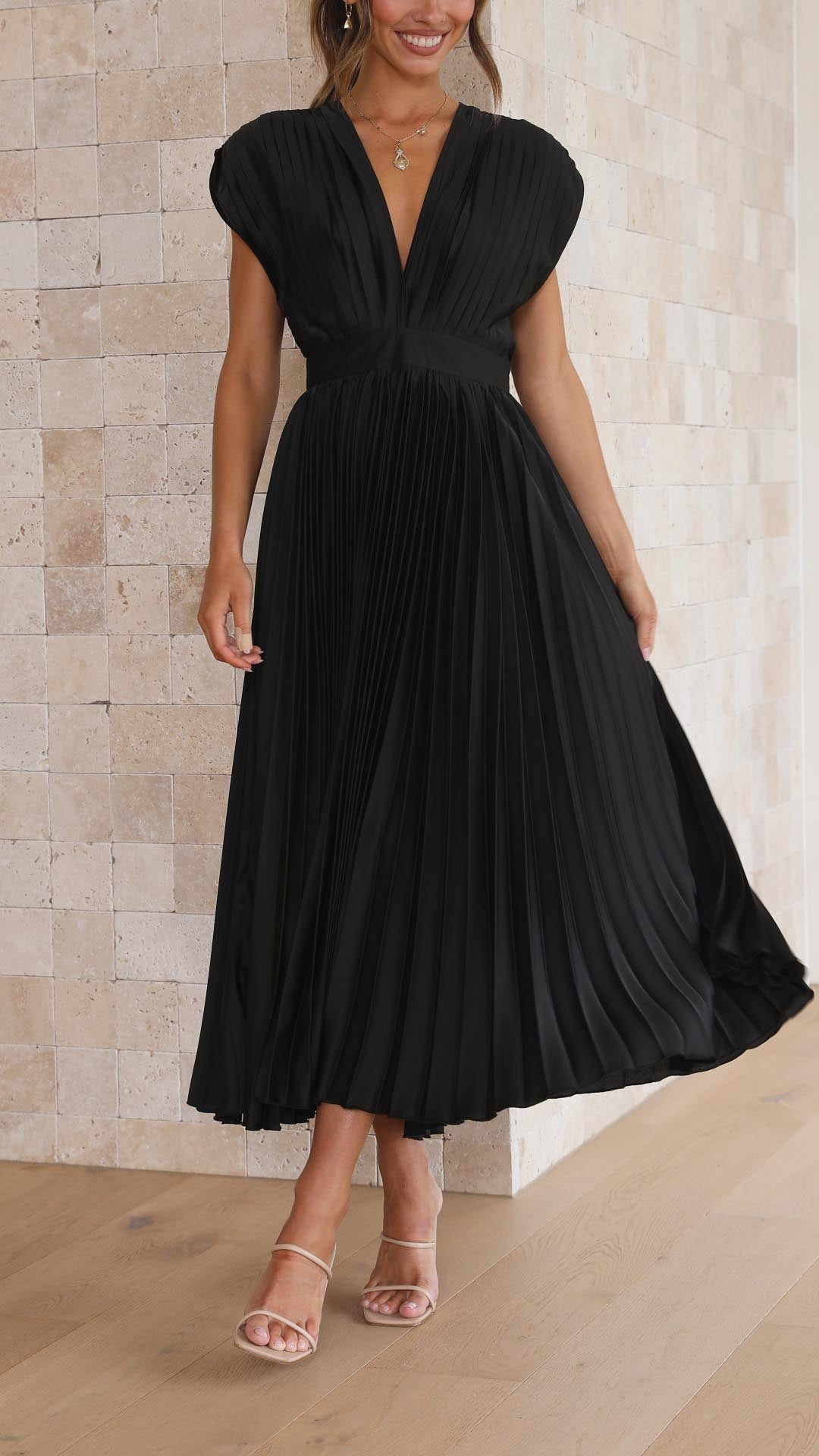 Classic pleated V-neck midi dress for women, perfect as a wedding guest outfit.