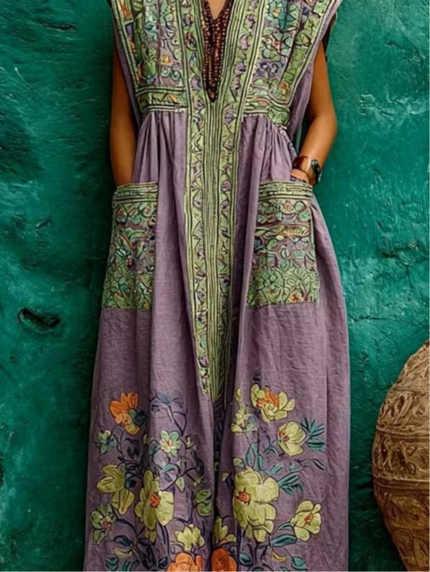 Flowing purple floral V-neck maxi dress for women, elegant summer vacation wear with a sleeveless design & contrast border.