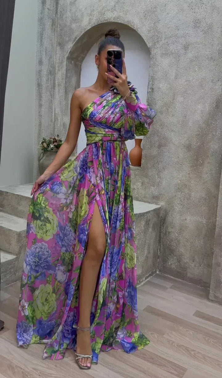 Women's formal maxi dress, ideal for evening events & summer occasions. Flowy purple design, elegant wedding guest attire.