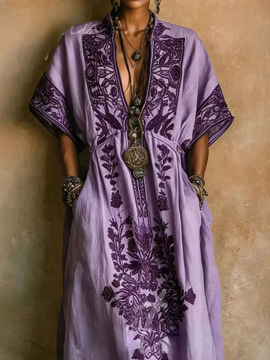 Women's flowy purple boho maxi dress with embroidered details & batwing sleeves. Ideal for beach, vacation, or summer wear.