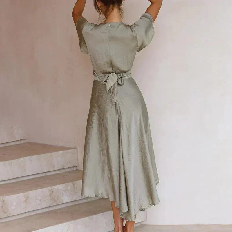 Olive women's V-neck tie-front midi dress with flowy flutter sleeves, an elegant choice for evening wear.
