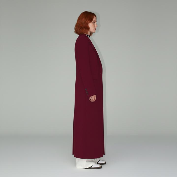Sophisticated women's ruby long tailored coat, elegantly fitted, ideal for structured city fashion.
