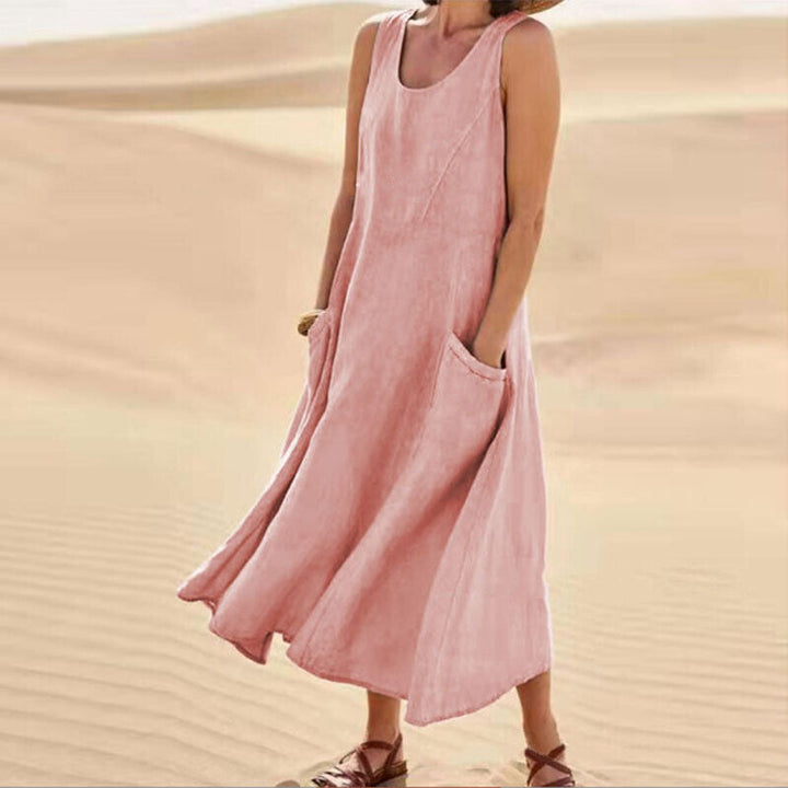 Elegant and comfortable women's summer dress, sleeveless midi style with a flattering loose fit and pockets.