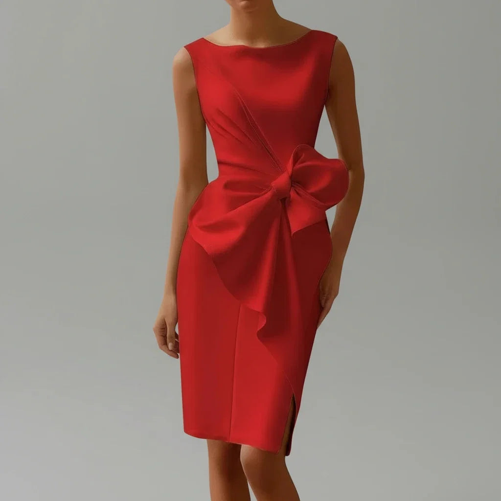 Stylish white sleeveless midi dress with elegant bow for women, great for special occasion or party wear.