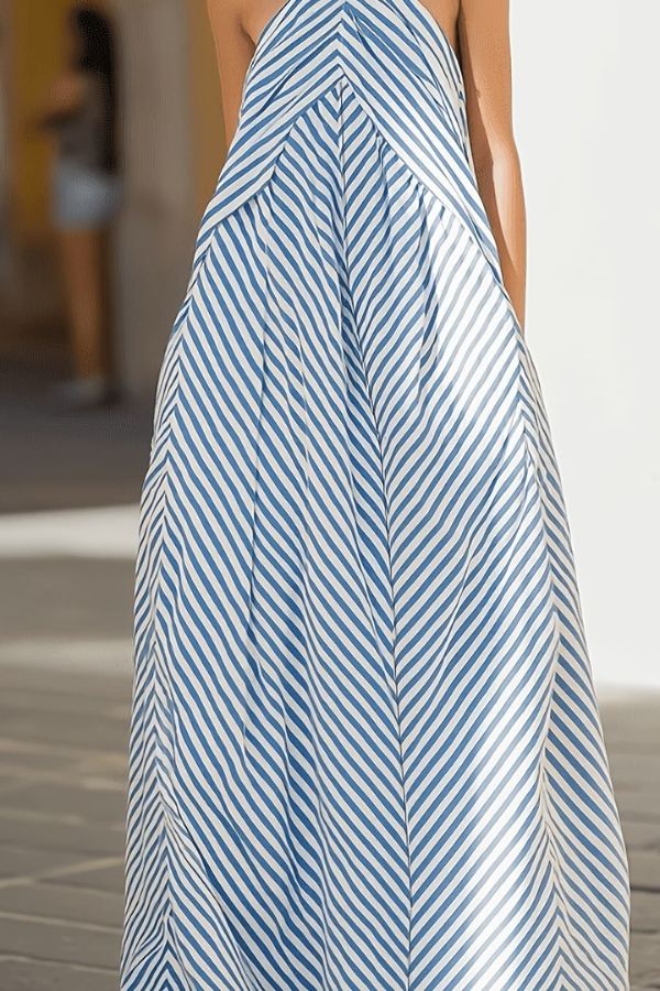 Beautiful women's striped halter maxi dress. A stylish vacation, summer, or party dress with an elegant open back.