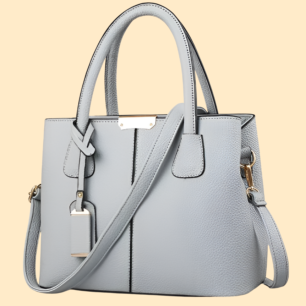 Stylish women's structured satchel handbag, an elegant fashion accessory perfect as a cross-body or shoulder bag.