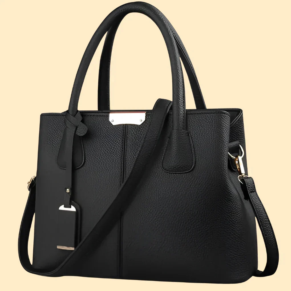 Classic women's structured satchel handbag, functioning as a stylish shoulder bag or versatile crossbody accessory.