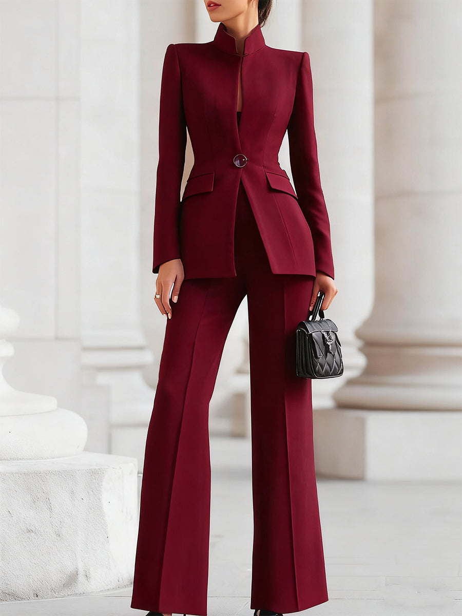 Sophisticated women's workwear suit, a tailored blazer and classic trousers for a polished, professional look.