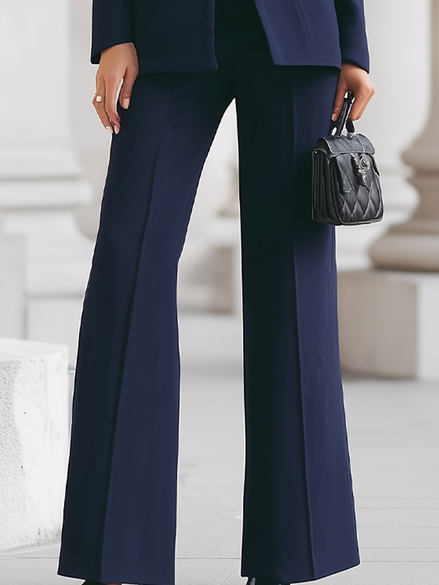 Complete elegant women's outfit: a tailored blazer and trouser suit set, suitable for business and formal events.