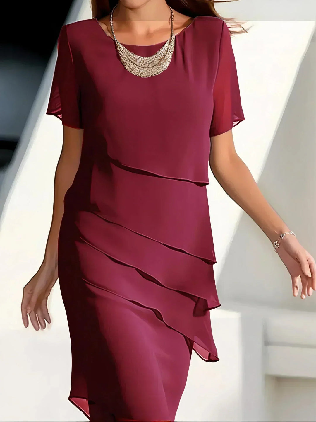 Sophisticated women's tiered midi dress, elegant design for parties & spring/summer occasion wear.