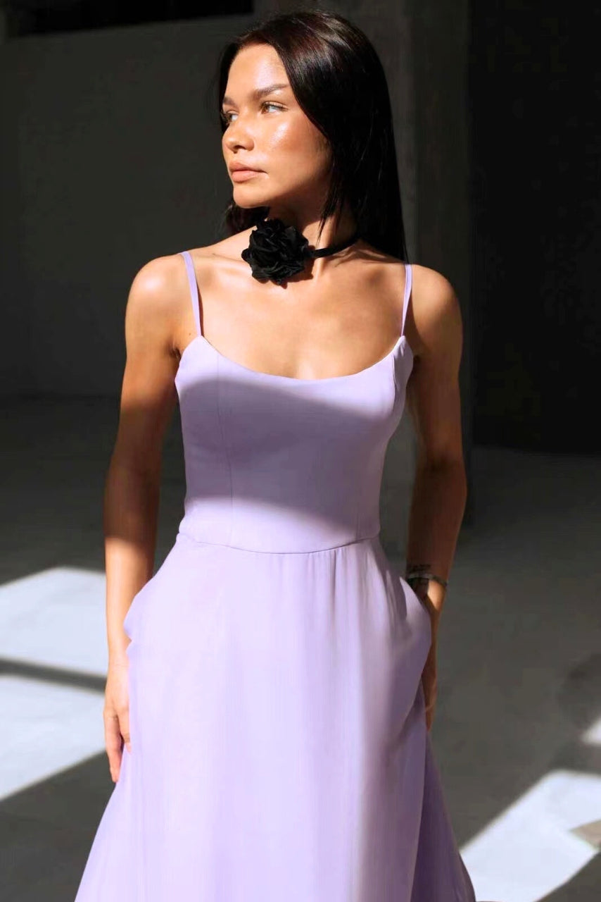 Chic wedding guest dress for women, featuring a feminine flowy twirl silhouette. Elegant party wear.