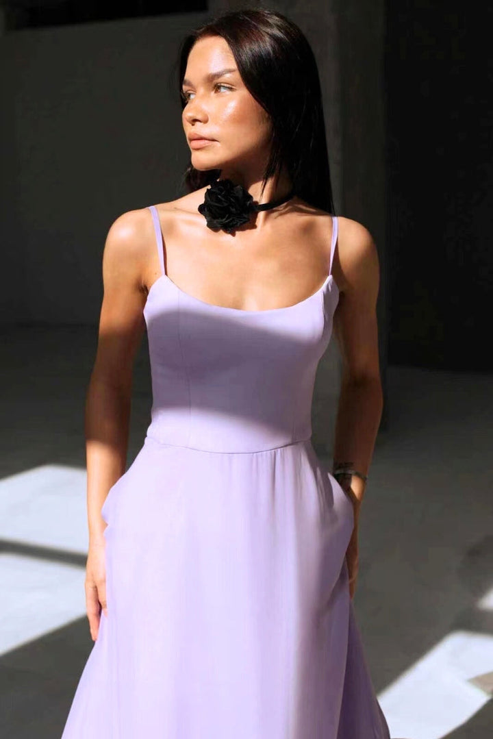Chic wedding guest dress for women, featuring a feminine flowy twirl silhouette. Elegant party wear.