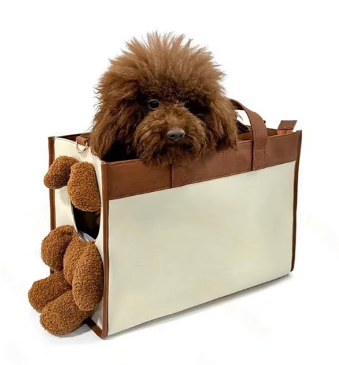 Elegant unisex pet carrier handbag for small dogs and cats, perfect for stylish car travel.