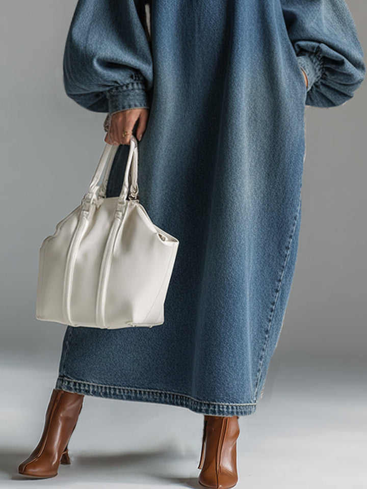 Women's stylish blue button-down maxi dress, elegant urban fashion, ideal for versatile day-to-night wear.