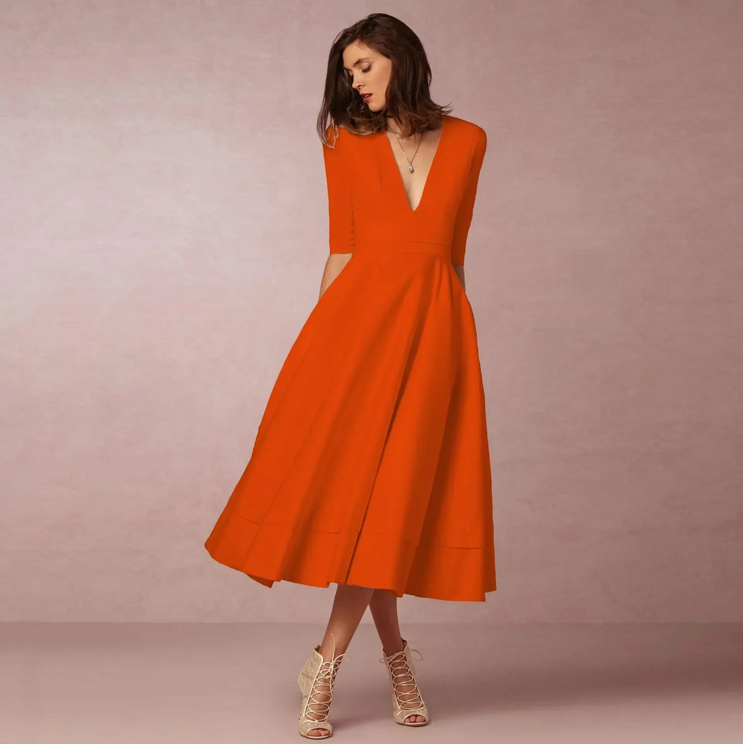 Beautiful women's V-neck midi dress, elbow sleeves, elegant and comfortable for any occasion.